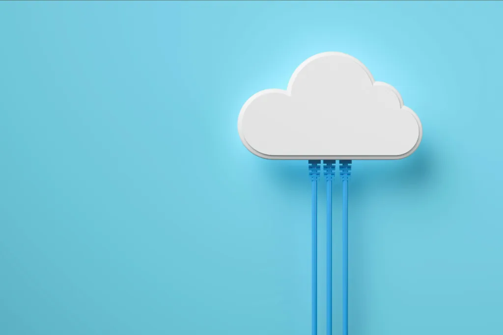 An image of a white stylized 3d cloud with wire attached to the bottom on a blue background.
