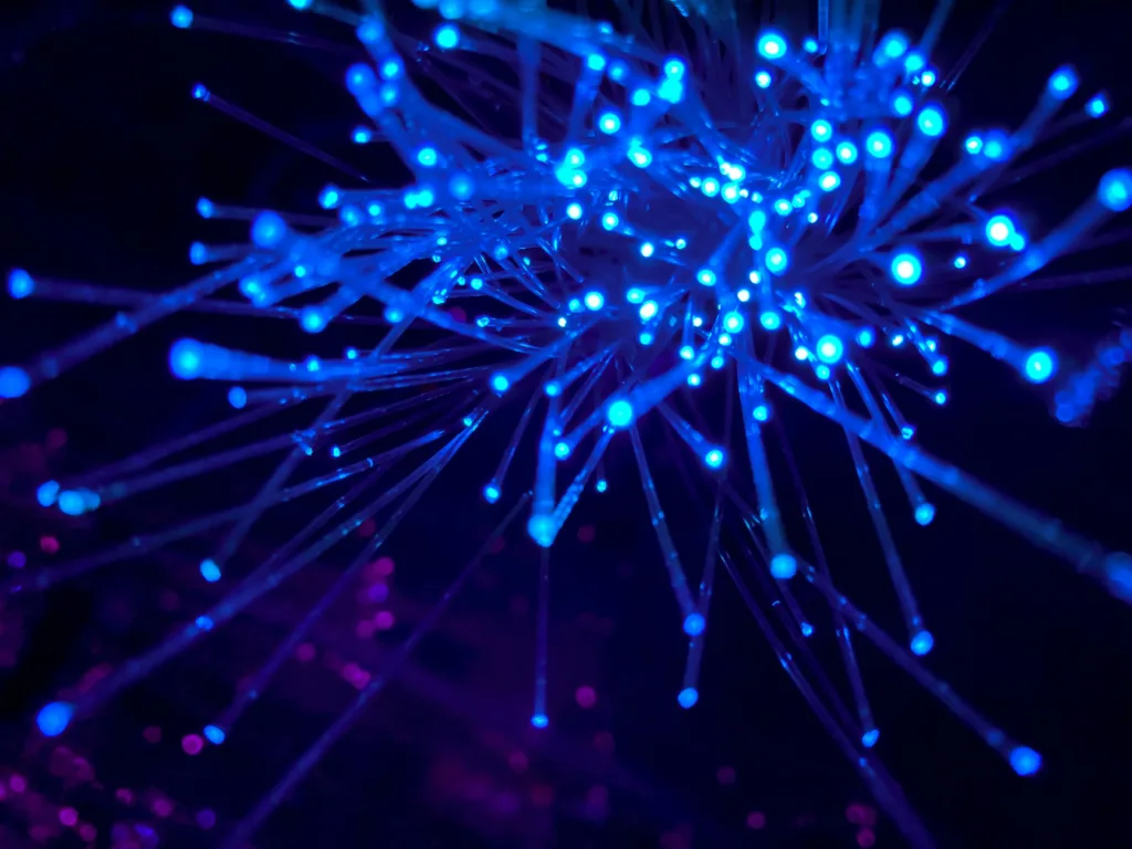 Blue wires representing optic fiber cables of the internet.